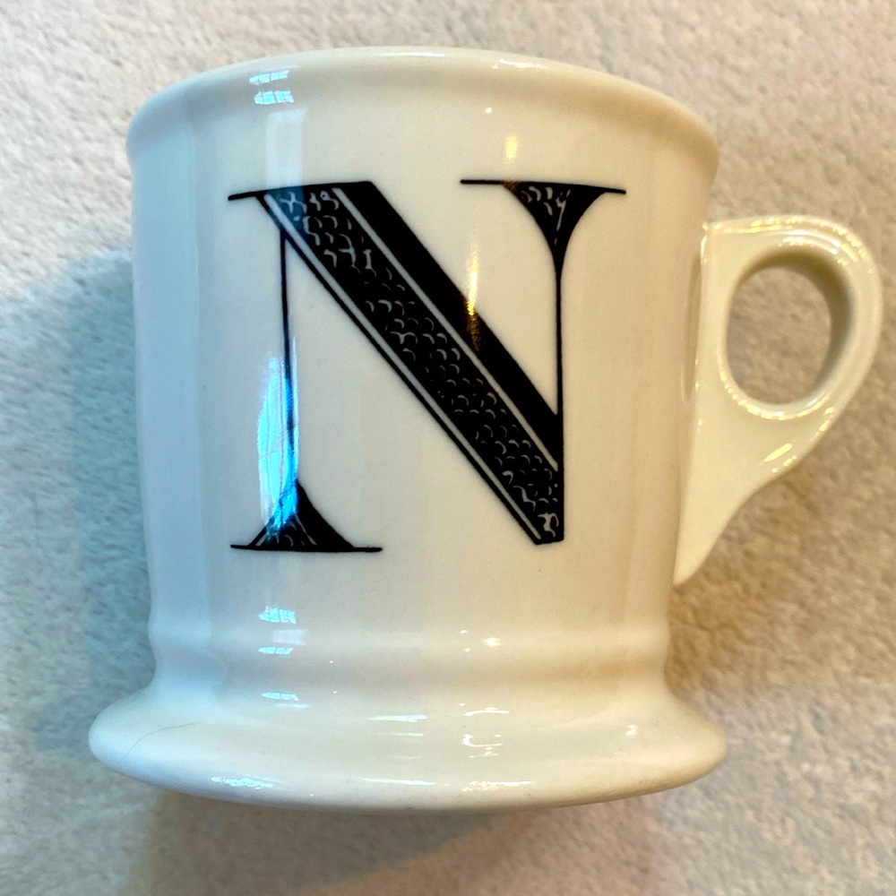 Anthropologie cream stoneware coffee tea mug with black initial “N” EUC